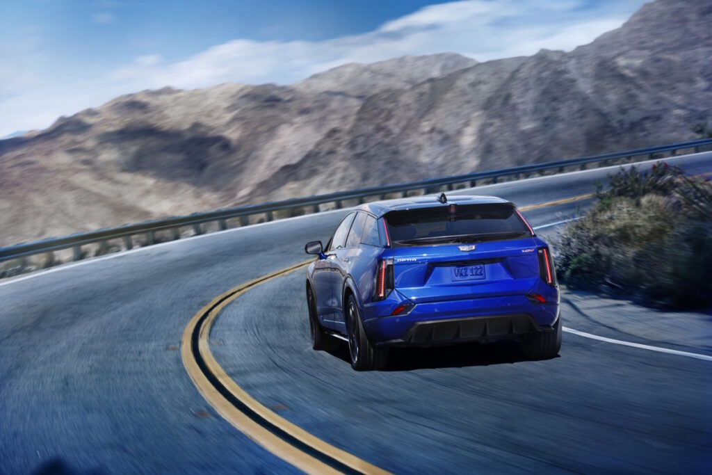 Rear view of the 2026 Cadillac OPTIQ-V in Deep Ocean Tintcoat